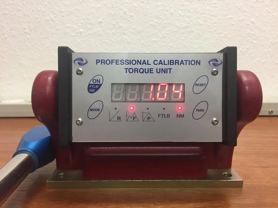 AWS torque tool tester showing a torque reading