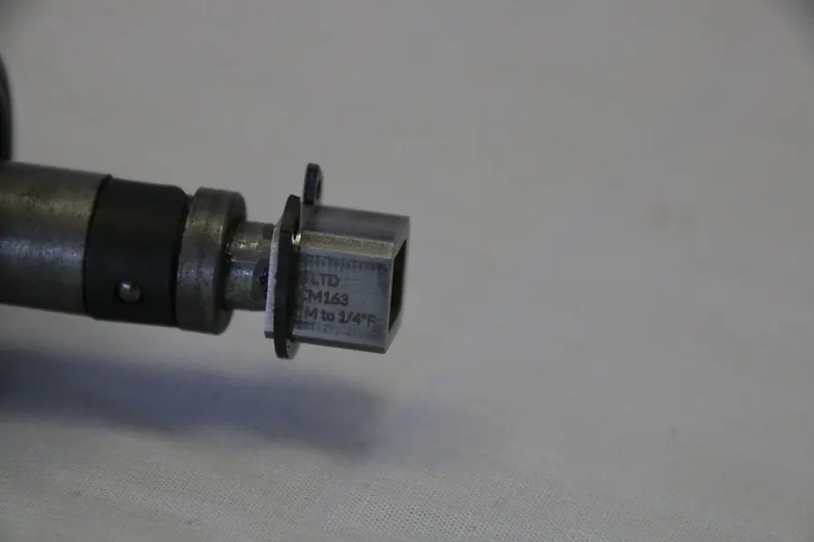 Precision Torque Adapter on the drive of a torque screwdriver