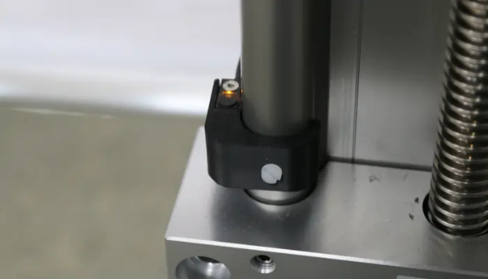 Travel Limit Sensor on a torque wrench calibrator crosstrack