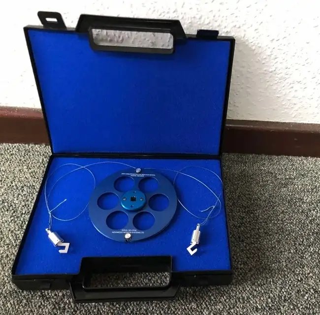 Blue torque wheel stored in a blue carry case