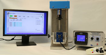 Torque screwdriver calibrator connected to a laptop to submit readings into a software program